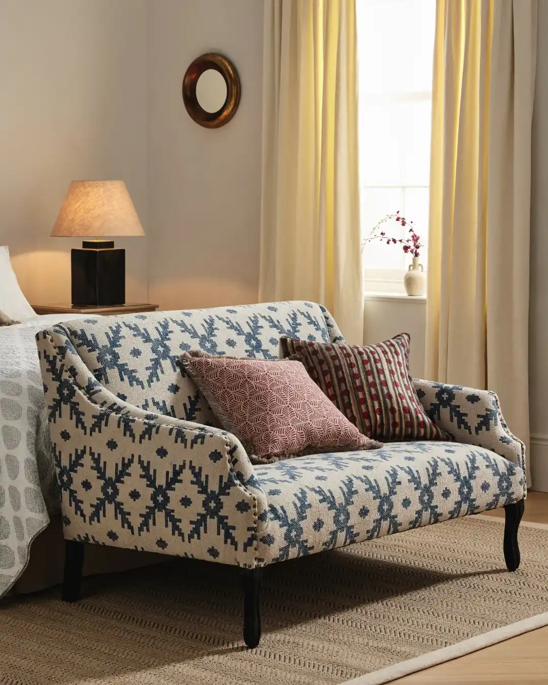 15 Small Living Room Decor Ideas That Feel Luxurious on a Budget 16 15. Choose a Patterned Loveseat Instead of a Full Sofa
