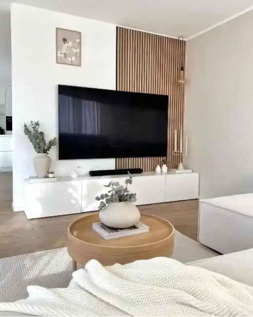 15 Small Living Room Decor Ideas That Feel Luxurious on a Budget 6 5. Add a Wood Slat Accent Wall Behind the TV