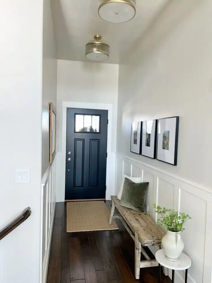 12. A Reclaimed Wood Bench Fits Along a Narrow Hallway Wall Where a Chair Never Could