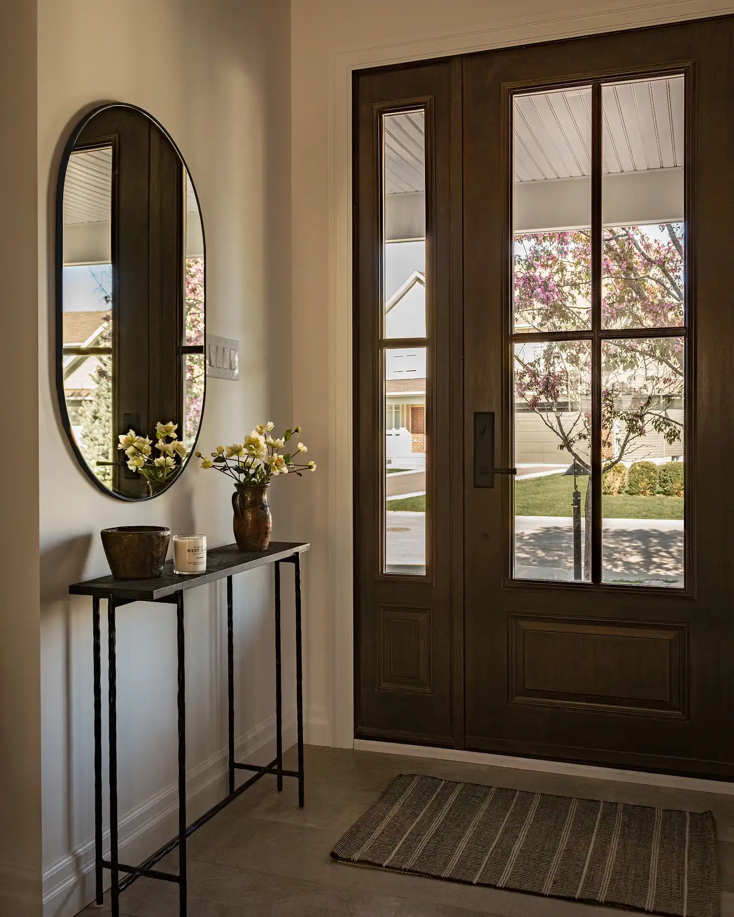 13. A Skinny Iron Console Barely Touches the Wall in This Tight Corner
