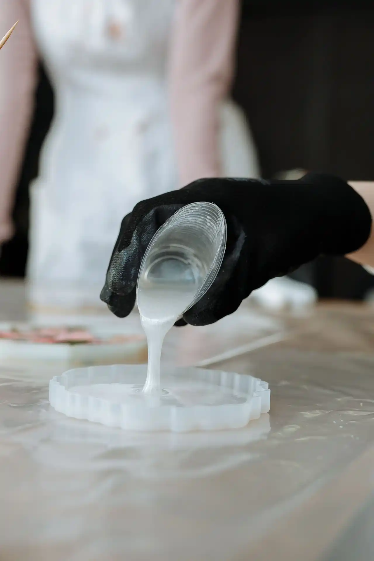 Mixing clear epoxy resin in silicone cup